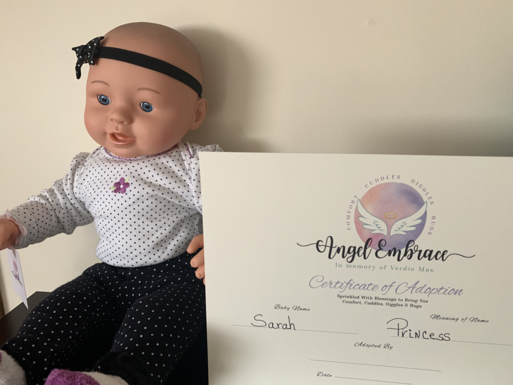 Baby with Adoption Certificate