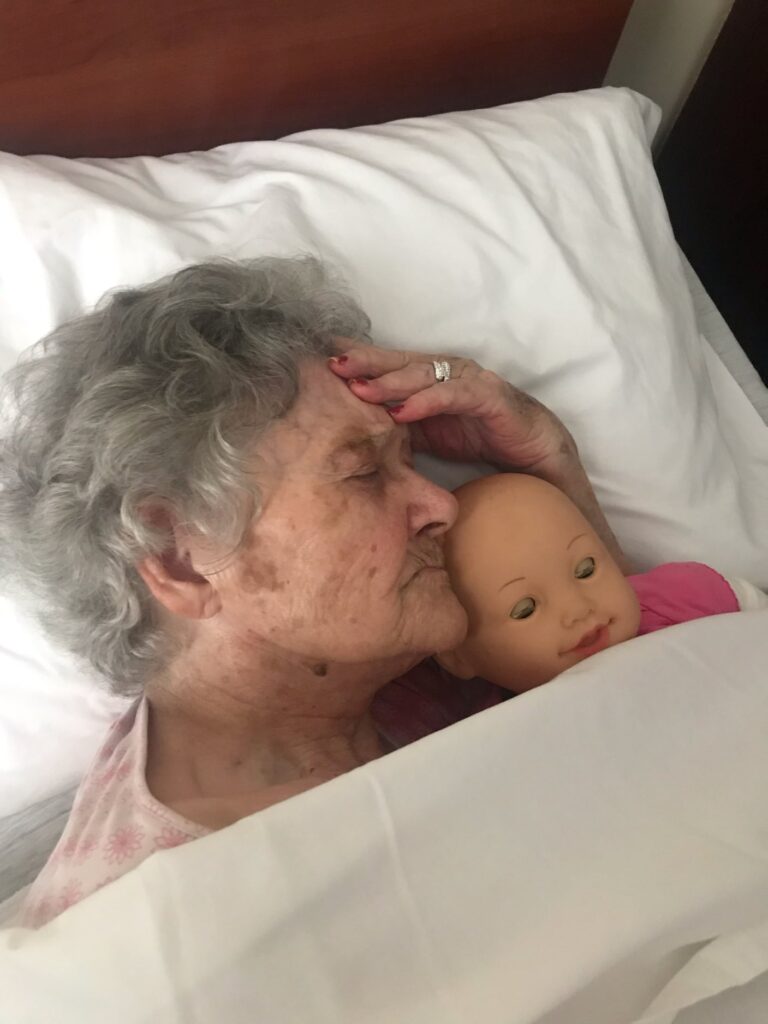 Verdie Mae sleeping with baby
